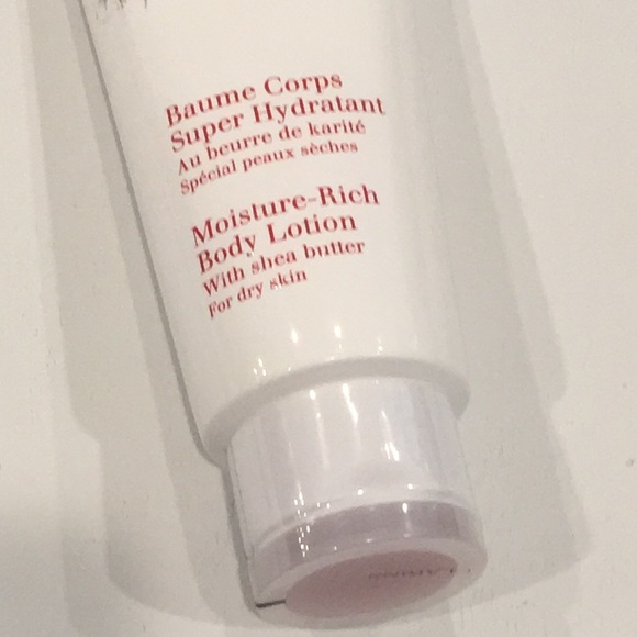 Clarins Paris | Lotions & Makeup Bag Set - Picture 10 of 12